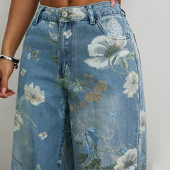 Pantalon en jean délavé à imprimé floral