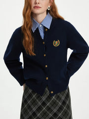 Cardigan vintage en maille brodée d'écussons