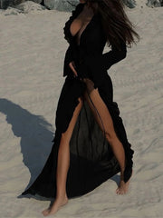 Robe longue en mousseline à volants et col en V