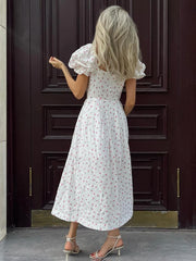 Robe maxi fendue imprimée à épaules dénudées