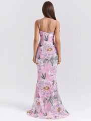 Robe de vacances rose à fleurs et fines bretelles spaghetti