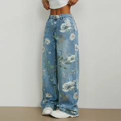 Pantalon en jean délavé à imprimé floral