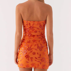 Robe moulante bustier à paillettes, perles et perles