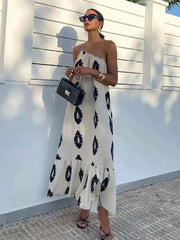 Robe midi asymétrique imprimée dos nu