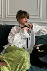 Chemisier sexy et élégant à manches cloche transparentes