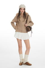 Gilet court en maille à capuche et col duveteux