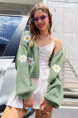 Gilet court ample en maille à motif floral doux