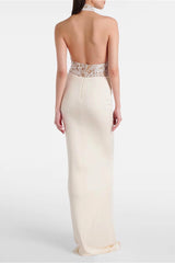 Robe de soirée moulante à dos nu et empiècements en dentelle taille haute