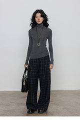 Sous-vêtement technique extensible à col roulé en laine douce