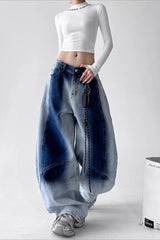 Jean vintage taille haute, jambes larges, délavage dégradé et coupe cintrée