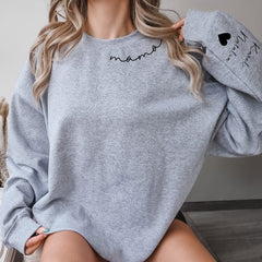 Sweat-shirt personnalisé « Maman » avec les noms des enfants sur les manches