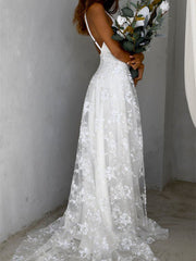 Robe longue ouverte en dentelle à col V 