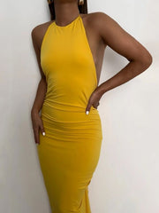 Robe moulante dos nu à volants et lacets 