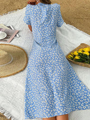 Robe bleue cintrée à imprimé de Noël 