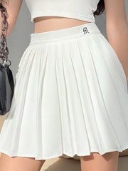 Jupe plissée taille haute et moulante 