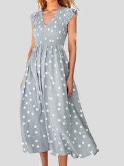 Robe à pois à col en V et manches courtes