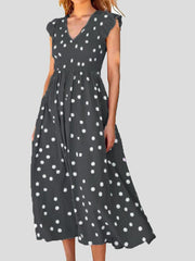 Robe à pois à col en V et manches courtes