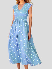 Robe à pois à col en V et manches courtes
