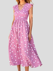 Robe à pois à col en V et manches courtes
