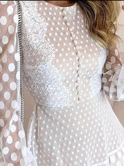 Robe à manches longues en dentelle à pois