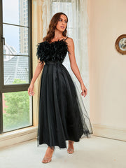 Robe de soirée dos nu en gaze à plumes 
