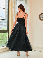 Robe de soirée dos nu en gaze à plumes 