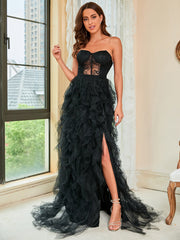 Robe de soirée bustier fendue en résille transparente à plumes 
