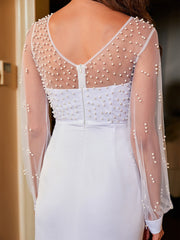 Robe de soirée bustier en résille perlée, portefeuille sur les hanches